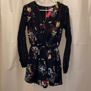 Romper with lace arms and slit back